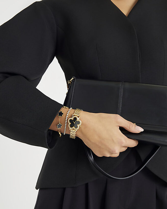 Armbandsset med guldklocka med blommönster
