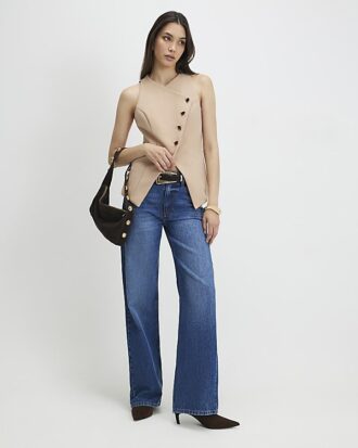 Beige asymmetrisk väst utan krage