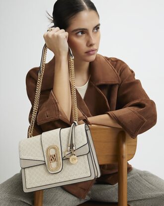 Beige axelväska med monogrampaneler