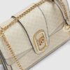 Beige axelväska med monogrampaneler