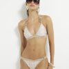 Beige bikinitrosa med geometriskt mönster