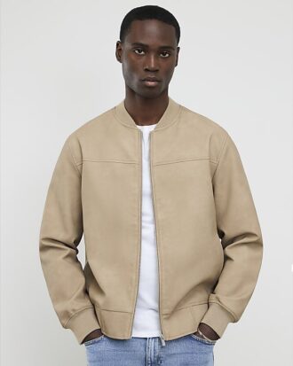 Beige bomberjacka i konstläder