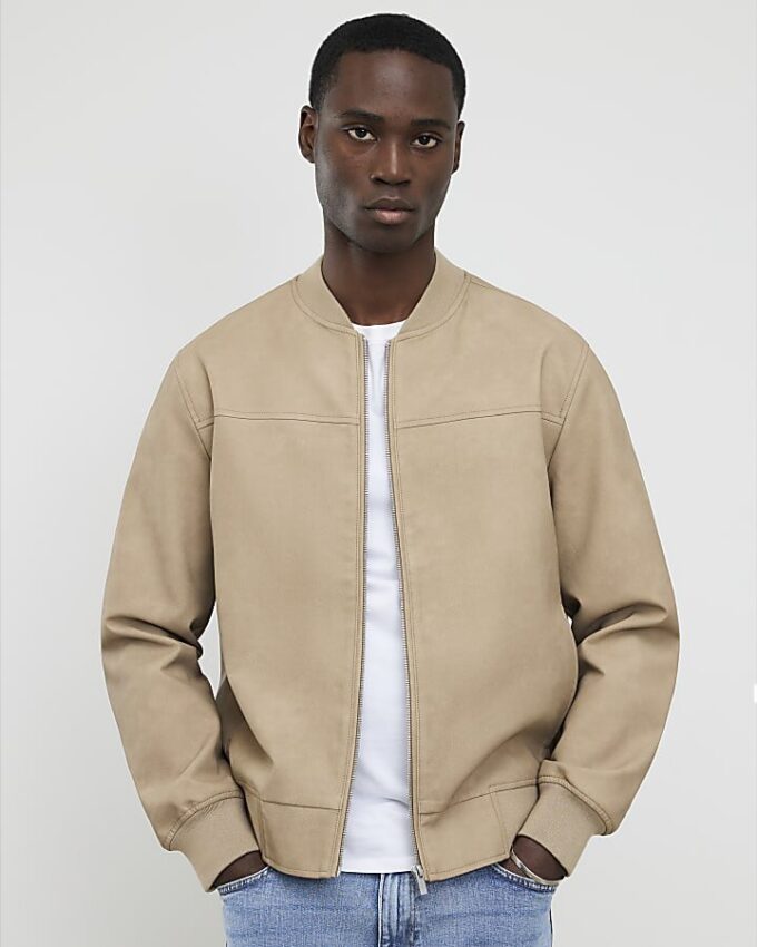 Beige bomberjacka i konstläder