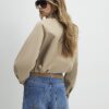 Beige bomberjacka med bubbelkant