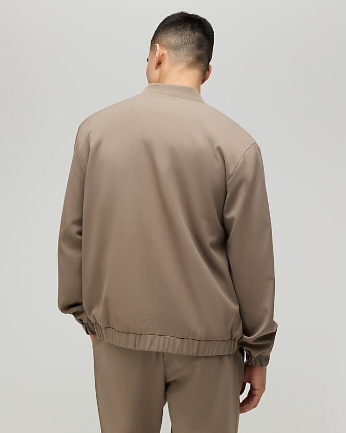 Beige bomberjacka med smal passform