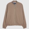 Beige bomberjacka med smal passform