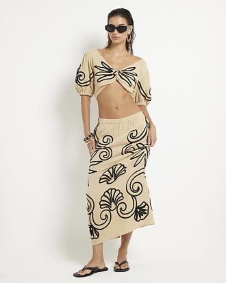 Beige broderad strandkroppstop