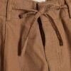 Beige cargobyxor med vid ben
