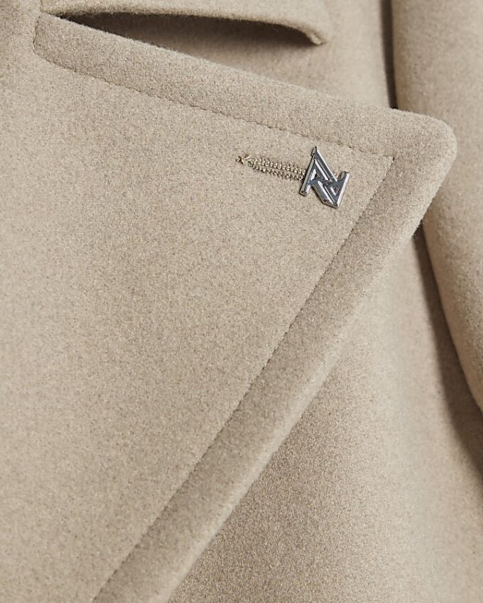 Beige dubbelknäppt peacoat