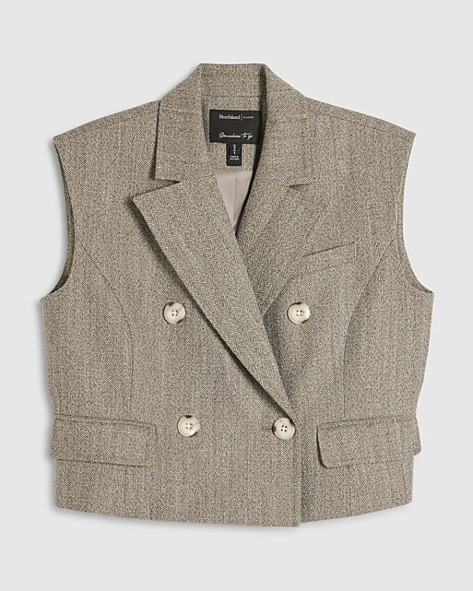 Beige fläckig väst