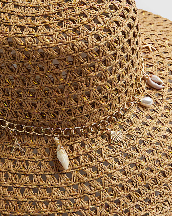 Beige floppy hatt med öppen väv