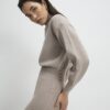 Beige jumperklänning med korsettdetaljer