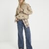 Beige kort trenchcoat med bubbelkant