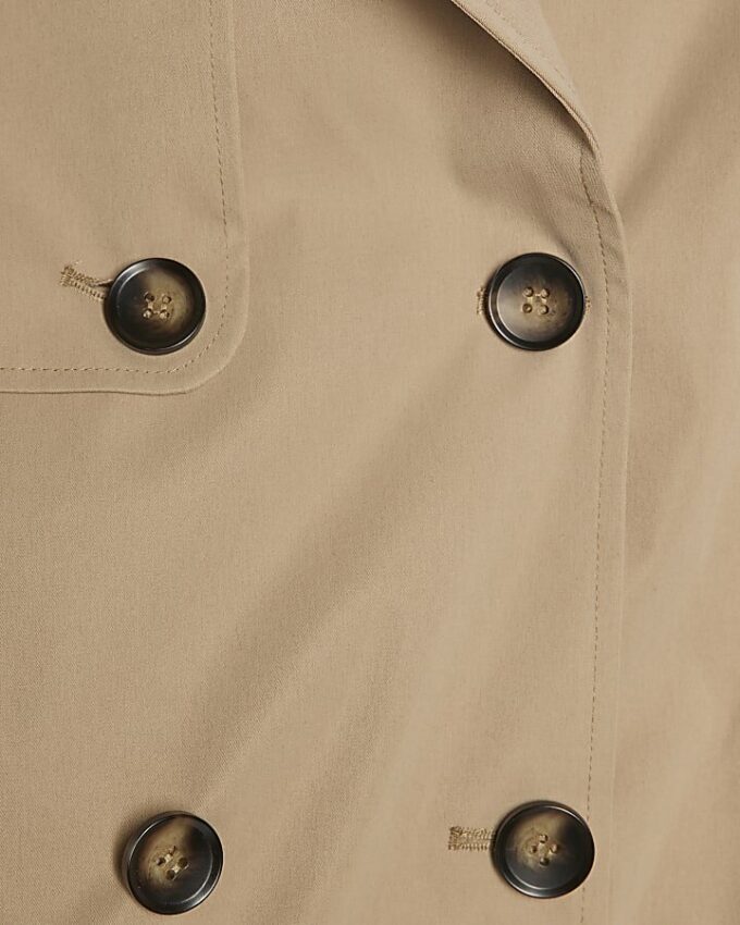 Beige kort trenchcoat med bubbelkant