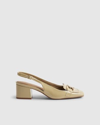 Beige loafers med spänne och slingback-klack