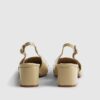Beige loafers med spänne och slingback-klack