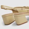 Beige loafers med spänne och slingback-klack