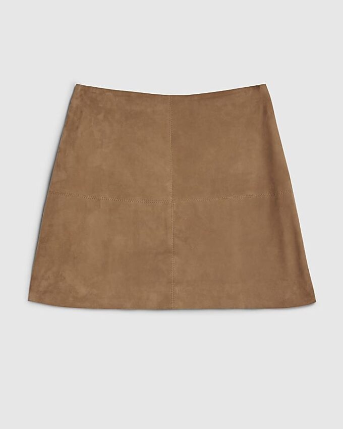 Beige minikjol i mocka med sömdetaljer