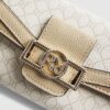 Beige miniväska med monogram