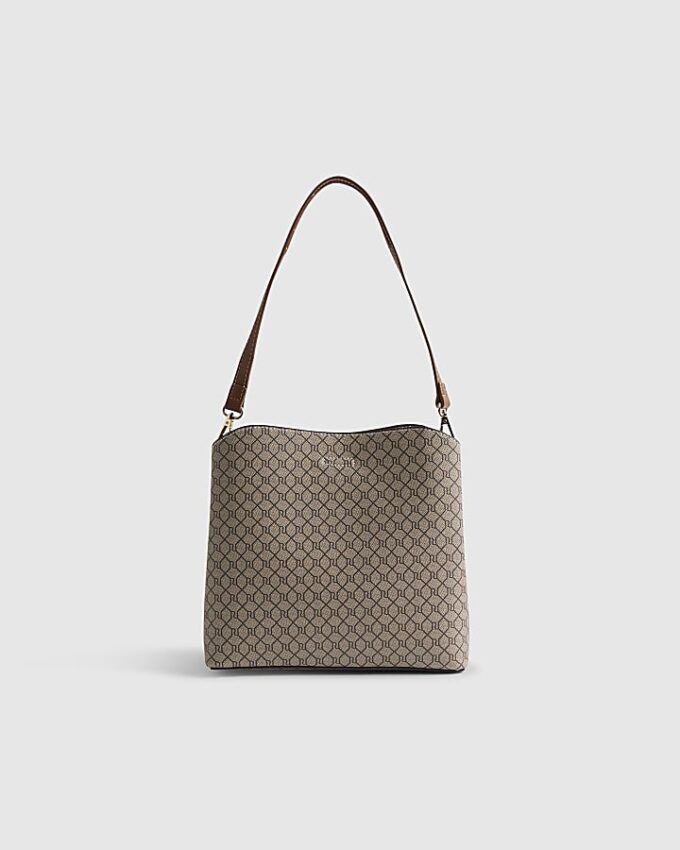Beige monogram-hinkväska i paket