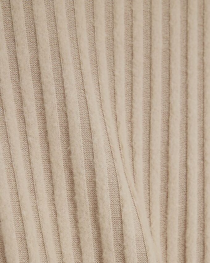 Beige mysig ribbad topp med knut på sidan