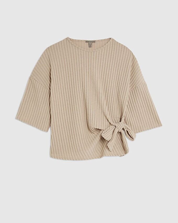 Beige mysig ribbad topp med knut på sidan
