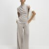 Beige mysig ärmlös draperad topp