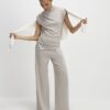 Beige mysiga byxor med vida ben