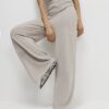 Beige mysiga byxor med vida ben