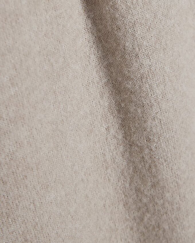 Beige mysiga byxor med vida ben