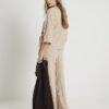 Beige Mysiga ribbade byxor med vida ben