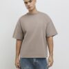 Beige oversized-passformad T-shirt