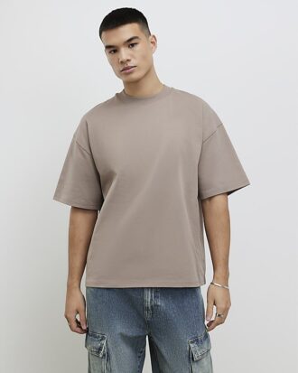 Beige oversized-passformad T-shirt