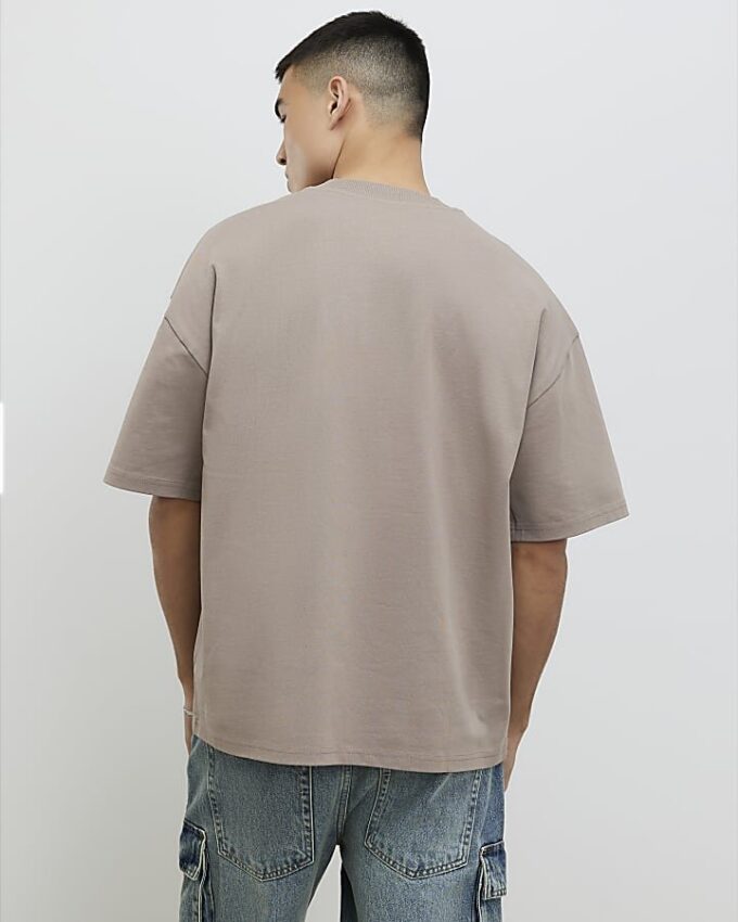Beige oversized-passformad T-shirt