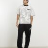 Beige oversized-passformad T-shirt med randig ficka