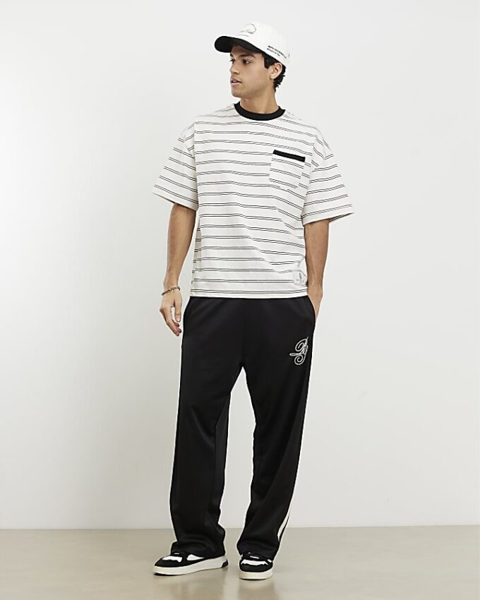 Beige oversized-passformad T-shirt med randig ficka