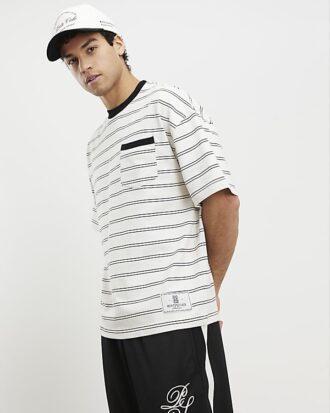 Beige oversized-passformad T-shirt med randig ficka
