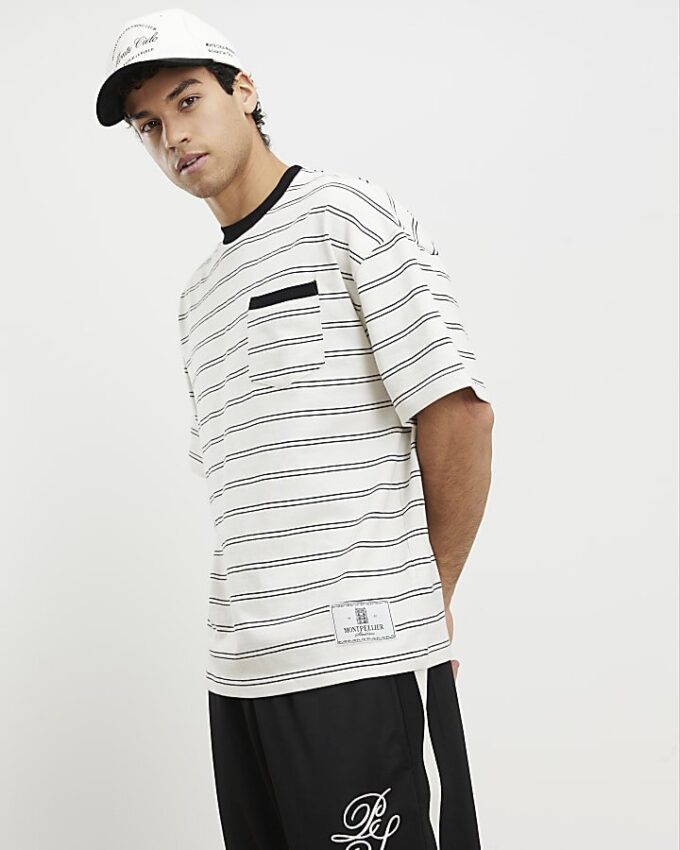 Beige oversized-passformad T-shirt med randig ficka