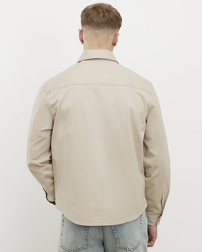 Beige overskjorta med normal passform, rundad fåll och dragkedja