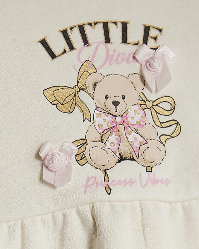 Beige peplum-tröja med björnmotiv för babyflickor