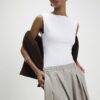 Beige plisserade byxor med barellben