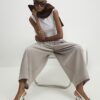 Beige plisserade byxor med barellben