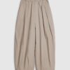 Beige plisserade byxor med barellben