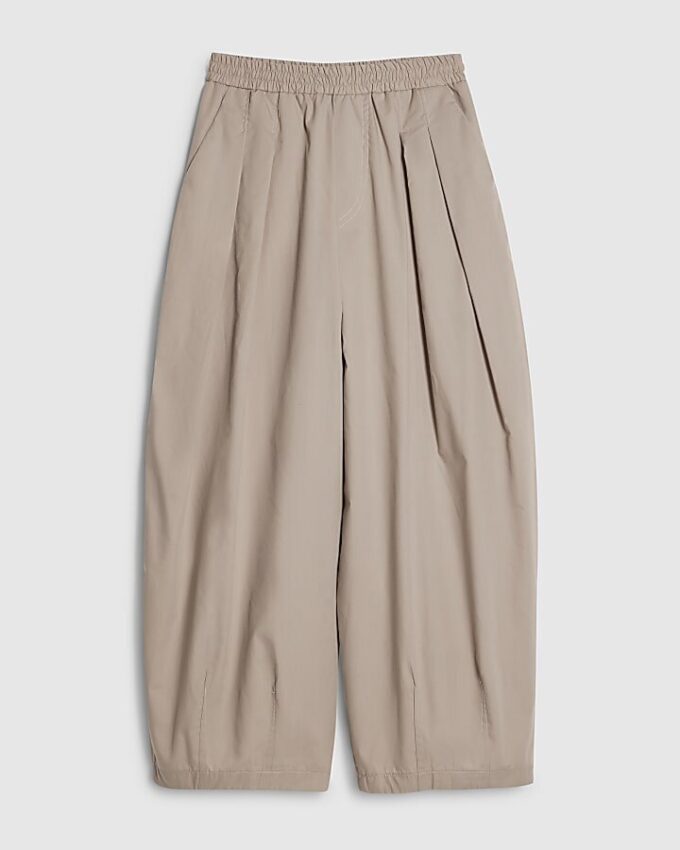 Beige plisserade byxor med barellben