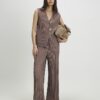 Beige plisserade byxor med vida ben