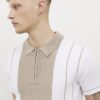 Beige polo med färgblockerade ränder