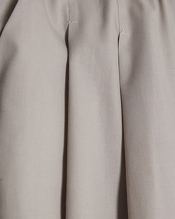 Beige poplinbyxor med vid ben