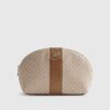 Beige randig sminkväska med monogram