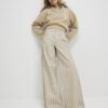 Beige randiga jeans med vida ben