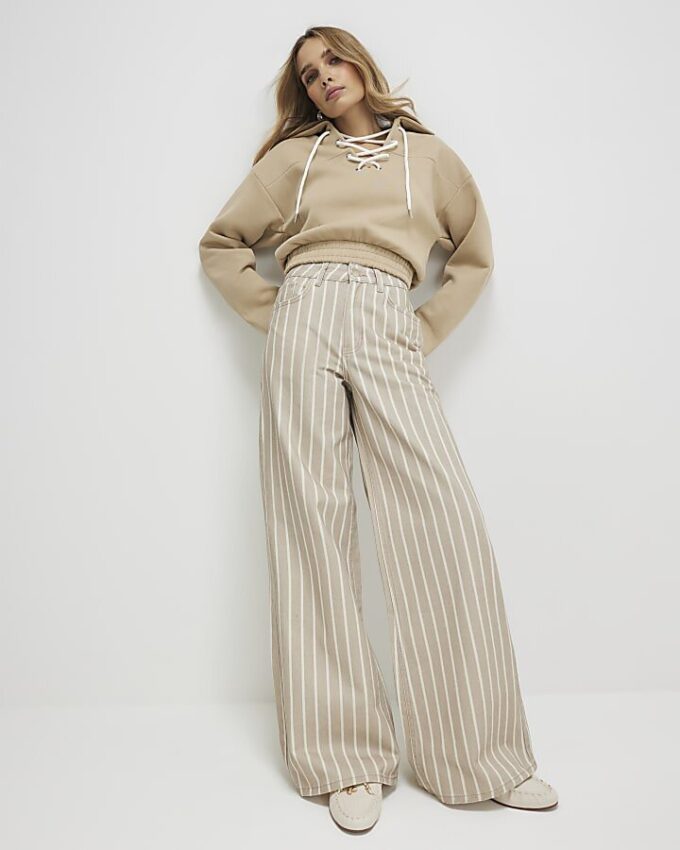 Beige randiga jeans med vida ben